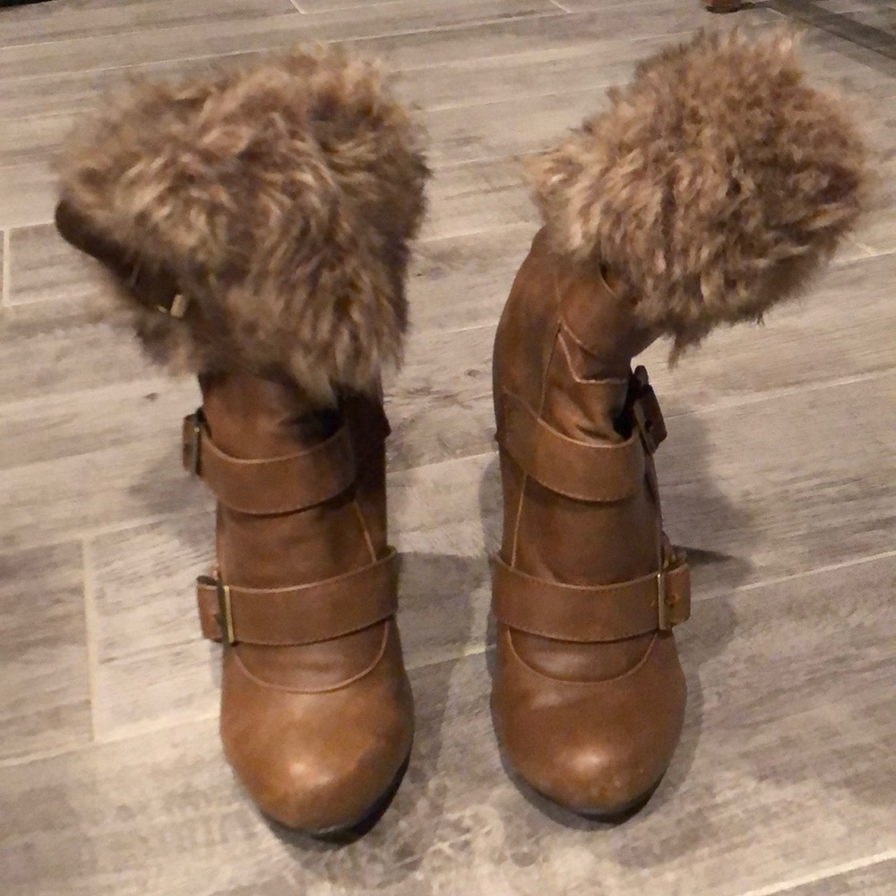 Gently used high heeled boots